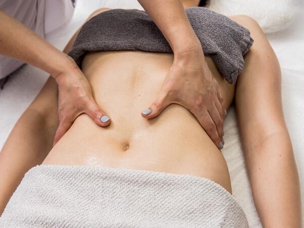 Bấm huyệt giảm mỡ bụng - Giải pháp lấy lại vóc dáng thon gọn